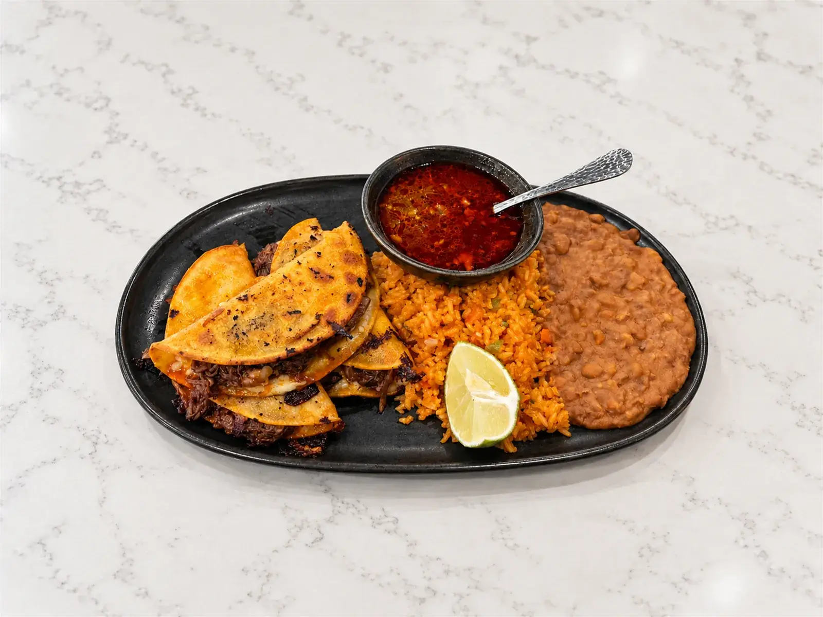 Aruma quesabirria tacos